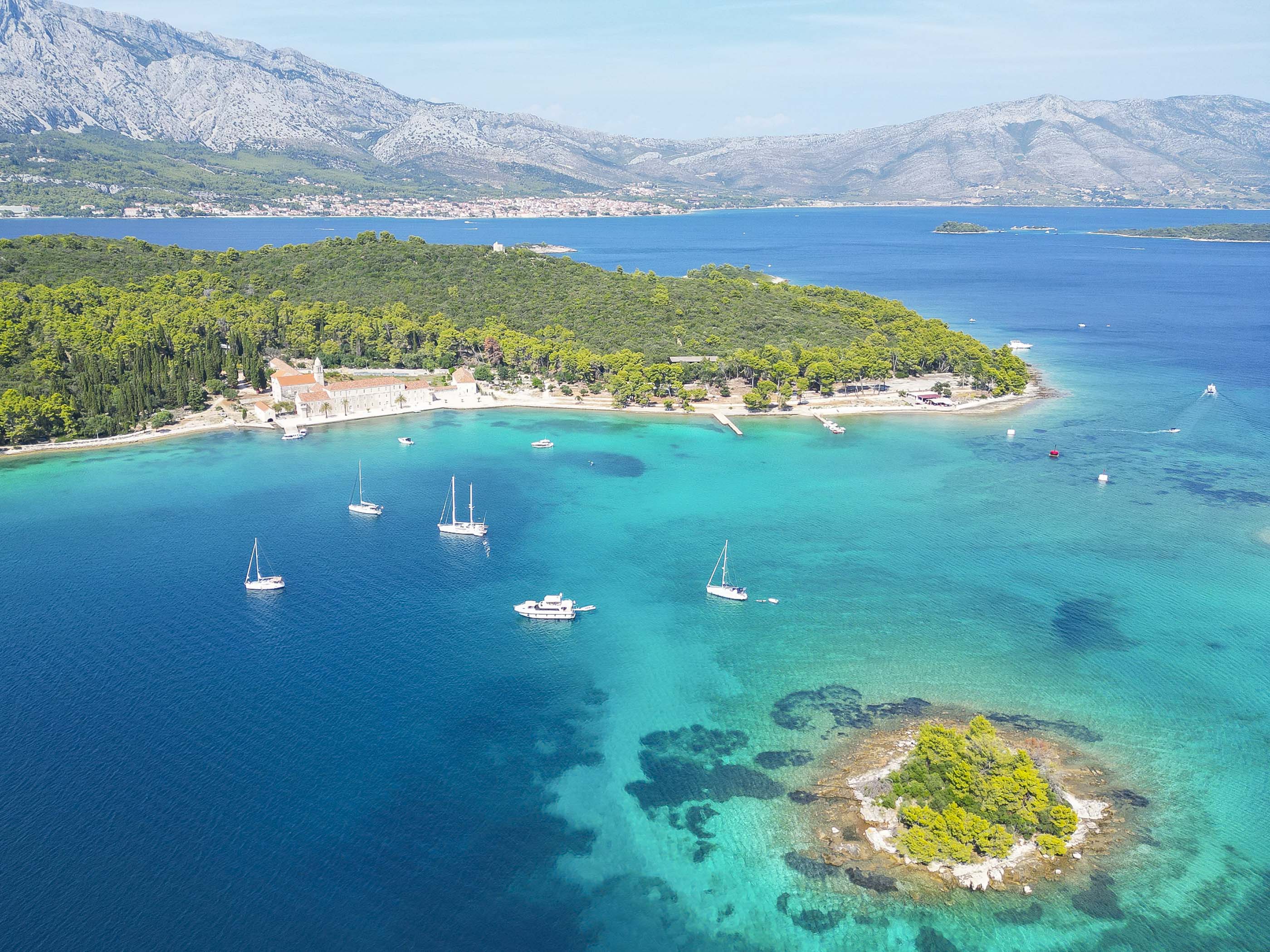 Small boat anchored in a bay